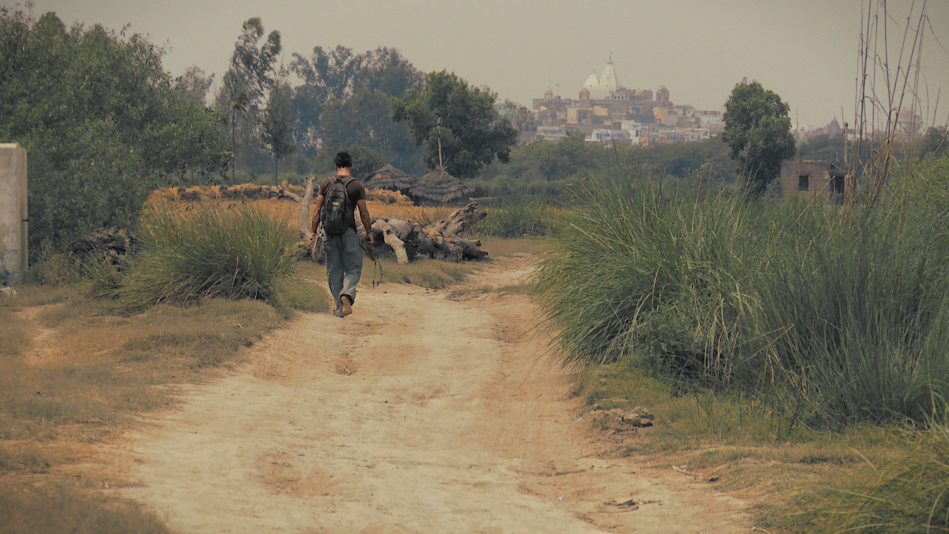 It's never too late to start walking in the right direction. Listen to what the world tells you, trust your guts to choose a path with heart. Sean Fletcher walks down the rural path by Nandagram, a still from the award-winning film 'Reconnection'.