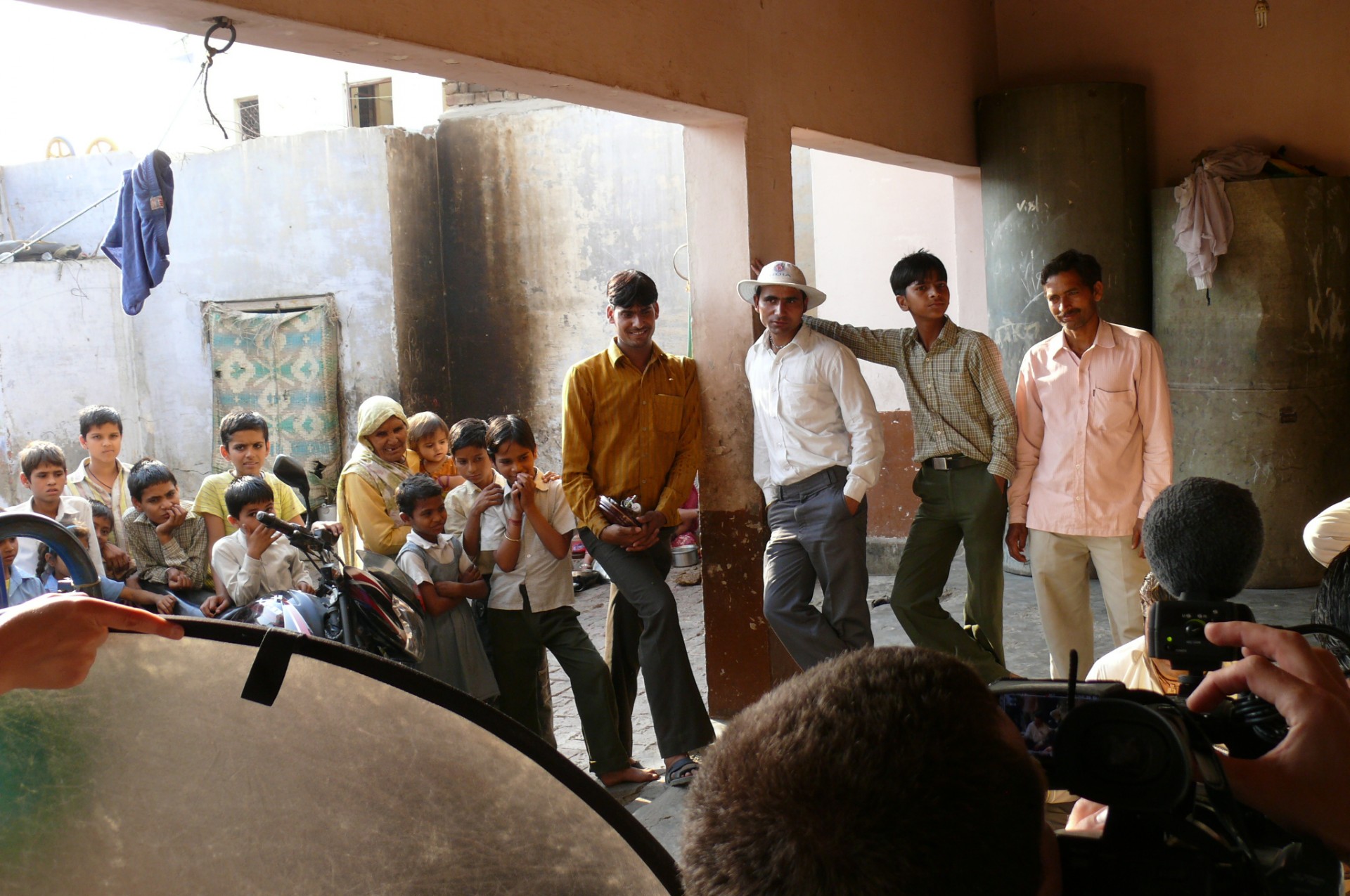 The entire village watches. Filming the lunch scene from the 'Reconnection' at the village house in Jet, India.