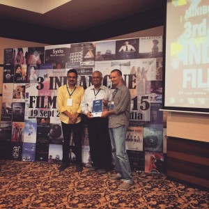 Maksim Varfolomeev, the director of 'Reconnection', receives an award from the legendary Indian filmmaker G.L. Bhardwaj, who worked with Raj Kapur and made such an acclaimed films as 'Shree 420' and 'Shocking Asia'. Indian Cine Film Festival, Mumbai, India, September 2015.